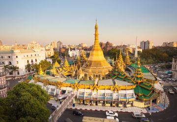 the Sule Pagoda, a prominent Buddhist temple and landmark situated in the heart of downtown Yangon, Myanmar