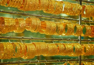 gold bangles, likely in a gold souk or market